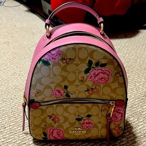 Mauve flowered Coach backpack - gently used